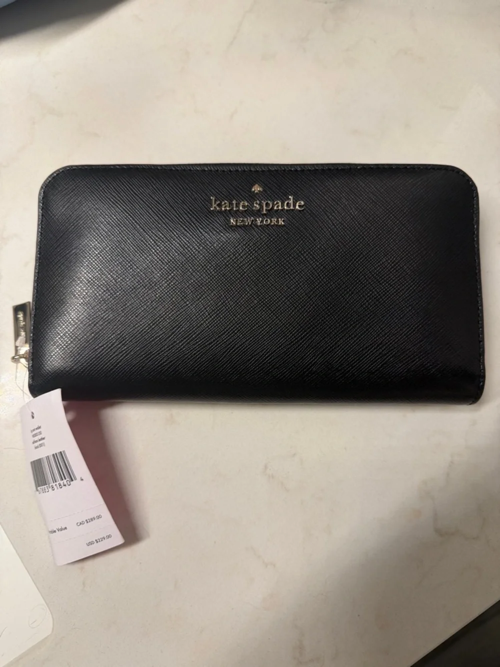 kate spade Black Leather Zip-Around Wallet with Gold Logo